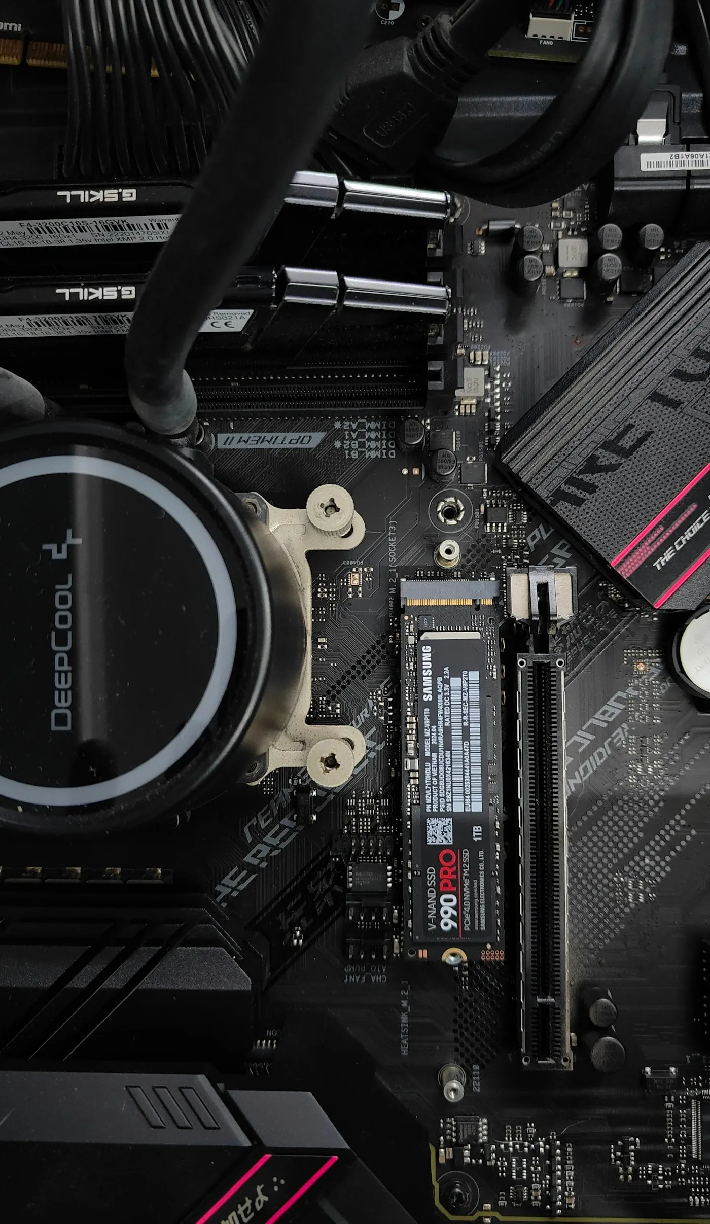 An NVMe solid-state drive seated in its M.2 slot on a computer motherboard